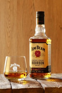 March 28, 2019, Minsk, Belarus, Bottle of kentucky straight bourbon whiskey with glass on wooden