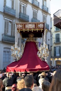 Good Friday procession, in a narrow alley, Malaga, Spain