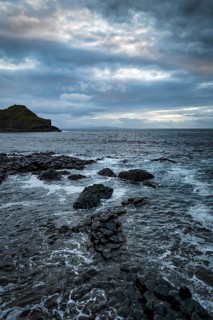 Rocky coast with black basalt columns, coastline, dusk by the sea, Giant's Causeway, Giants