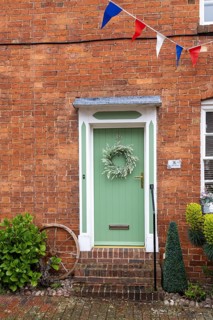 Green front door, Alcester, England, Great Britain