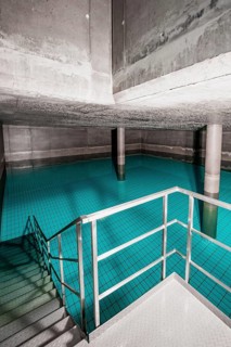 Large room with water, blue tiles and metal railings, Waterworks ENCW Netze Calw, Calw, Black