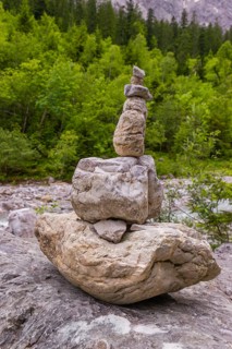 A stone mark at the Riss creek flowing through the Eng valley, Tyrol, Austria
