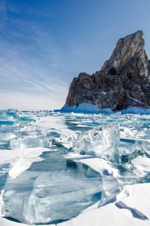 Ice in front of Shaman Rock, Lake Baikal, Olkhon Island, Pribaikalsky National Park, Irkutsk