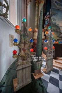On contour-cut and painted boards with religious motifs in front of the altar during Lent,