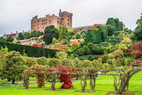 Autumn colors over Powis Castle and Garden, Welshpool, Powys, Wales, UK
