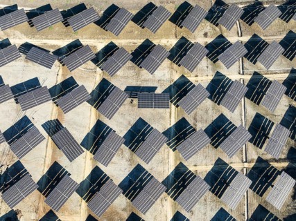 Rows of solar panels at a photovoltaic plant near Vejer de la Frontera. Aerial view. Drone shot.