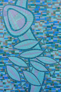A mosaic pattern with fish and plant-like motifs in shades of blue and green, Philippquelle,