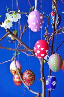 Easter, Easter bouquet with colorful Easter eggs, branches with flowers of an ornamental quince,