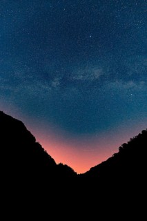 Milky Way in the night sky with mountains in the foreground, Ternitz, Lower Austria, Austria