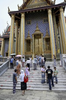 Tourists at Wat Phra Kaew, Temple of the Emerald Buddha, Bangkok, Thailand
