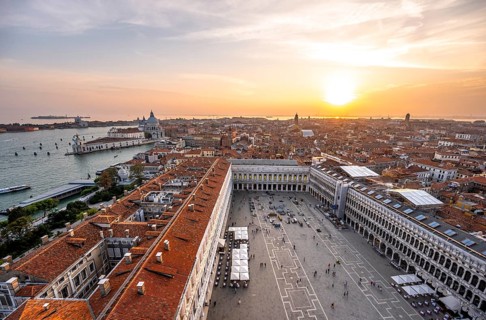 Panorama, St Mark's Square and Basilica di Santa Maria della Salute on the Grand Canal at sunset,