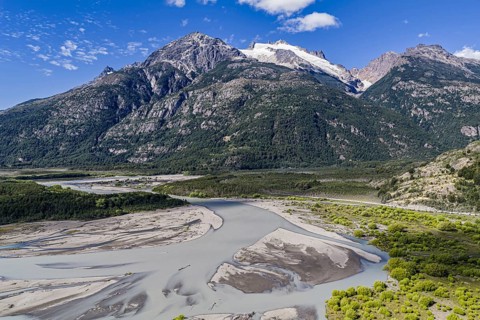 Road Carretera Austral, gravel road along river Rio Baker, south of Cochrane, aerial view,