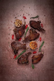 Fried veal ribs, with spices, baked in the oven, homemade, no people