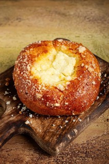 Bun with cottage cheese, pastries, cheesecake, no people
