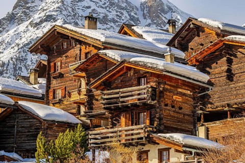 Snow-covered old farmhouses, historic town center, Grimentz, Val d'Anniviers, Valais Alps, Canton