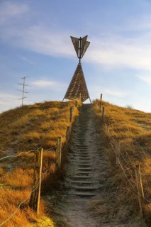Steps to the post beacon, historic sounding beacon in the dune landscape of Norderney, Lower