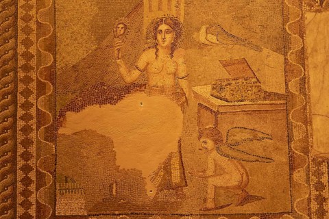 Ancient mosaic depicting the goddess Aphrodite and a winged Cupid leaning over an opened box,