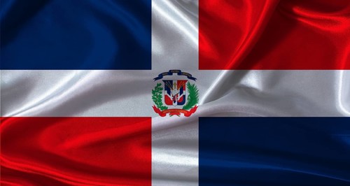 National flag of Dominican Republic with cloth texture. Dominican Republic flag with realistic