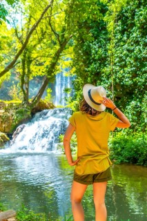 A female tourist visiting the Monasterio de Piedra Natural Park, Aragon, Spain