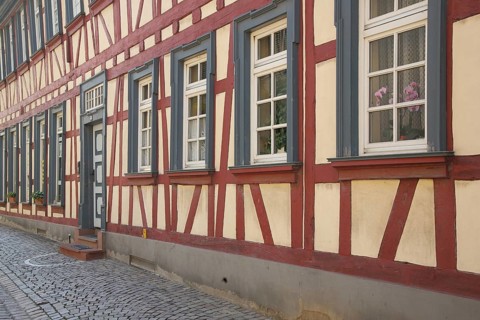 Hof Langwerth von Simmern, half-timbered house, house façade with row of windows and front door,