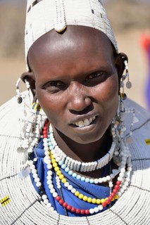 Maasai woman wearing traditional jewellery, Ngorongoro Conservation Area, Ndema, Tanzania