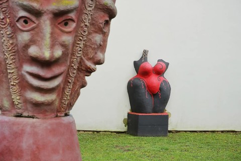 Two sculptures by artist Helmut Braig 2004, modern art, abstract art, two red faces with masks,