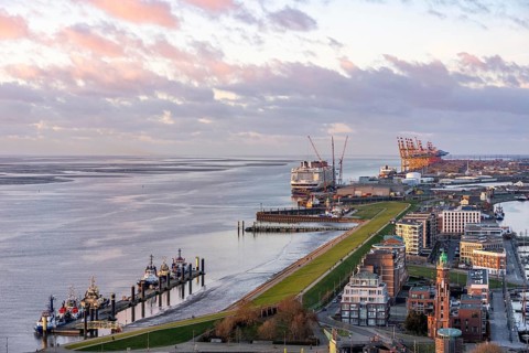 Disney Adventure cruise ship at Bremerhaven Cruise Port, MSC and Eurogate container terminal at