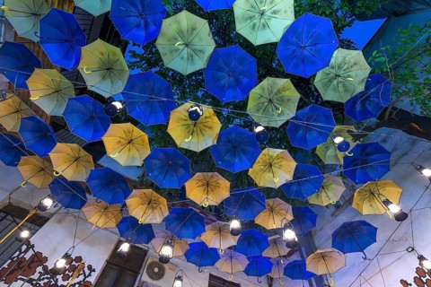 Umbrellas as decoration in a courtyard of a restaurant, Czernowicz, Ukraine