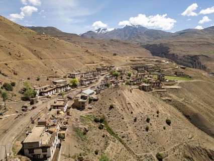 Scenic view of a tranquil village nestled in the arid mountains of Spiti Valley, India, showcasing