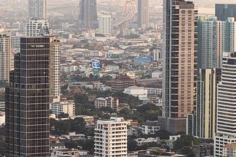 Over the rooftops of Bangkok, view from the Moon Bar on the roof terrace of the Banyan Tree Hotel,