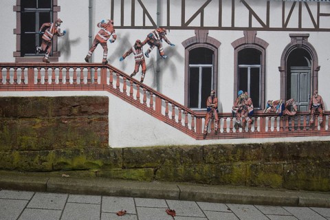 Mural construction by Jaune 2020, alleyway art, graffiti, construction workers jumping on