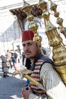 Damascus, Syria. December 4th 2025. A traditionally dressed Syrian juice seller outside the Umayyad
