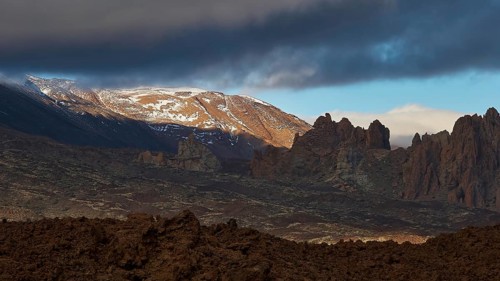 Llano de Ucanca, dramatic landscape with rock formations and partly cloudy sky, Teide, Parque