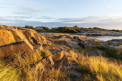 The warm evening light falls on the rocks of the archipelago, North Sea, west coast near Lerkil,