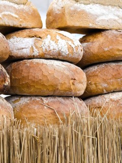 Loaves of artisan bread stacked on top of each other in Poland