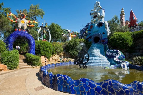 Colourful sculptures made of glass and mirrors, Giardino dei Tarocchi, Garden of Tarot, by Niki de
