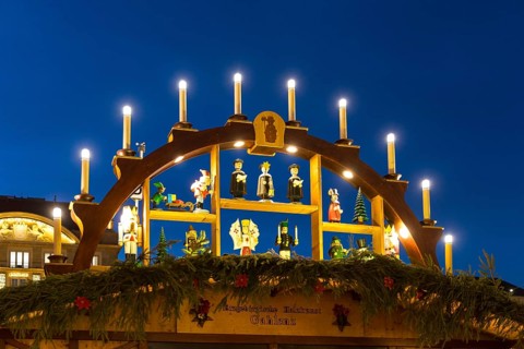 Detailed decoration on the stalls of the Striezelmarkt Christmas market, here a light arch with