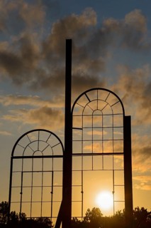 Two metallic window frames stand out against the dramatic sunset sky, Ilseder Hütte, Ilsede, Peine