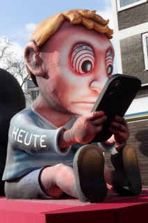 Boy staring at cell phone, motive car for youthful social media addiction, social media ban, theme