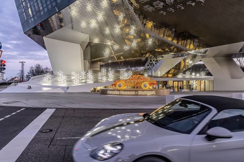 Highlights on Porscheplatz in Zuffenhausen. In front of the Porsche Museum and the car