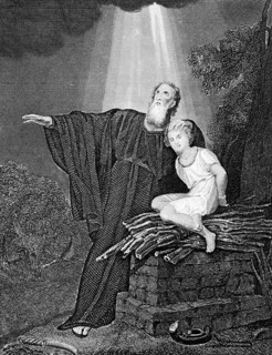 Abraham sacrifices his bound son Isaac, sacrificial altar, fear of God, rays of light from heaven,