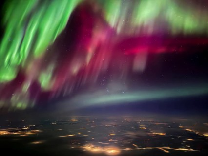 Northern lights, aurora borealis, aerial view from an airplane, Finland