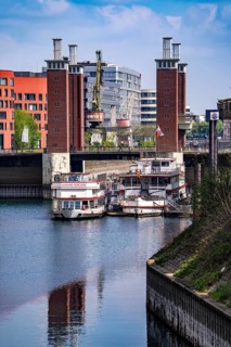 The Schwanentor bridge in the inner harbour of Duisburg, one of 3 lifting bridges, can be raised up
