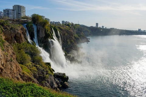 Extensive coastal view with waterfall, urban environment and calm sea, Lower Düden Waterfall, Düden