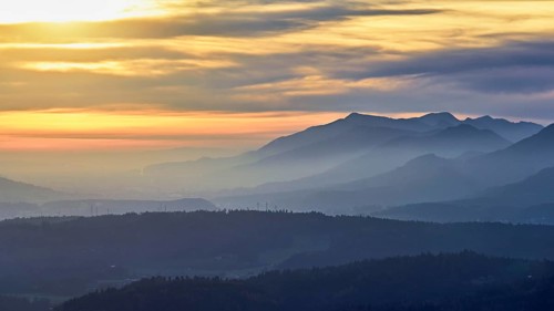 View of the Jura foothills from the Gisliflue, in the light of the setting sun, Talheim, Canton,