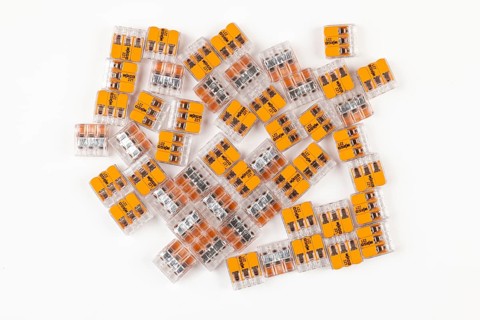 Numerous connection terminals for electrical installations on a white background