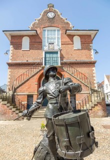 'The Drums of Fore and Aft' drummer boy sculpture by Arnold, Earl of Albemarle, Shire Hall, Market