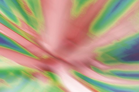This image features a dynamically blurred background with a blend of vivid colors, ideal for use in