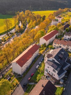 Residential street on the edge of a rural area with neighbouring fields and villas, Nagold,