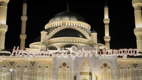 Muslims perform Tarawih prayers at the Millet Mosque, the second largest mosque in Turkey, which is